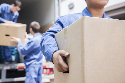 Professional same day removals team loading furniture in Soho