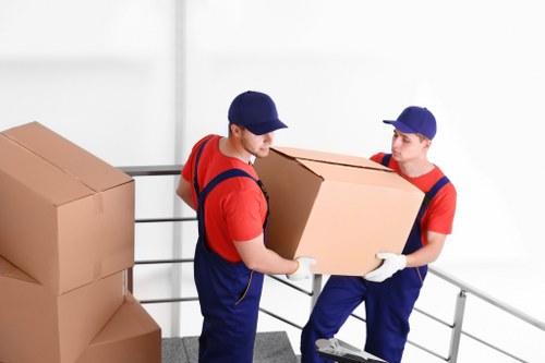 Professional van moving furniture and boxes in Soho